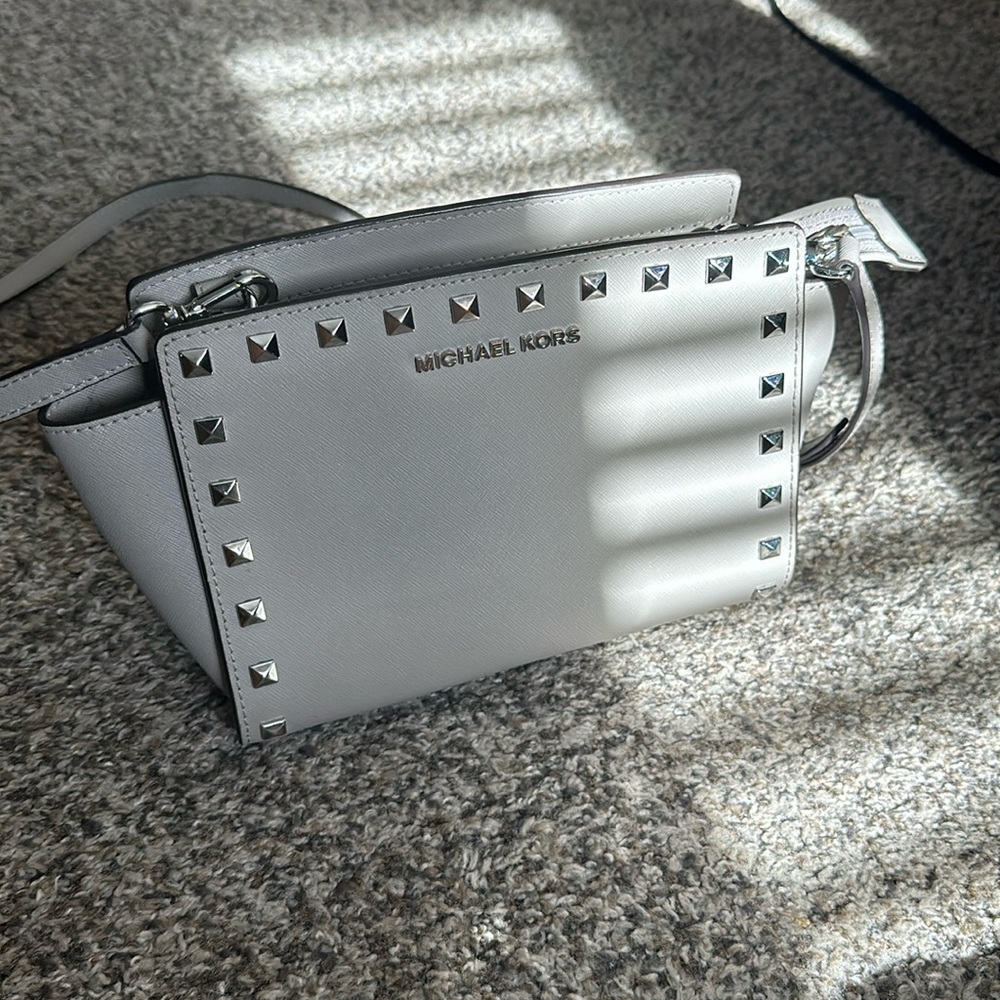 Gray crossbody with silver accents